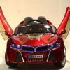 ماشین شارژی بی ام و متالیک مانتیور دار i8